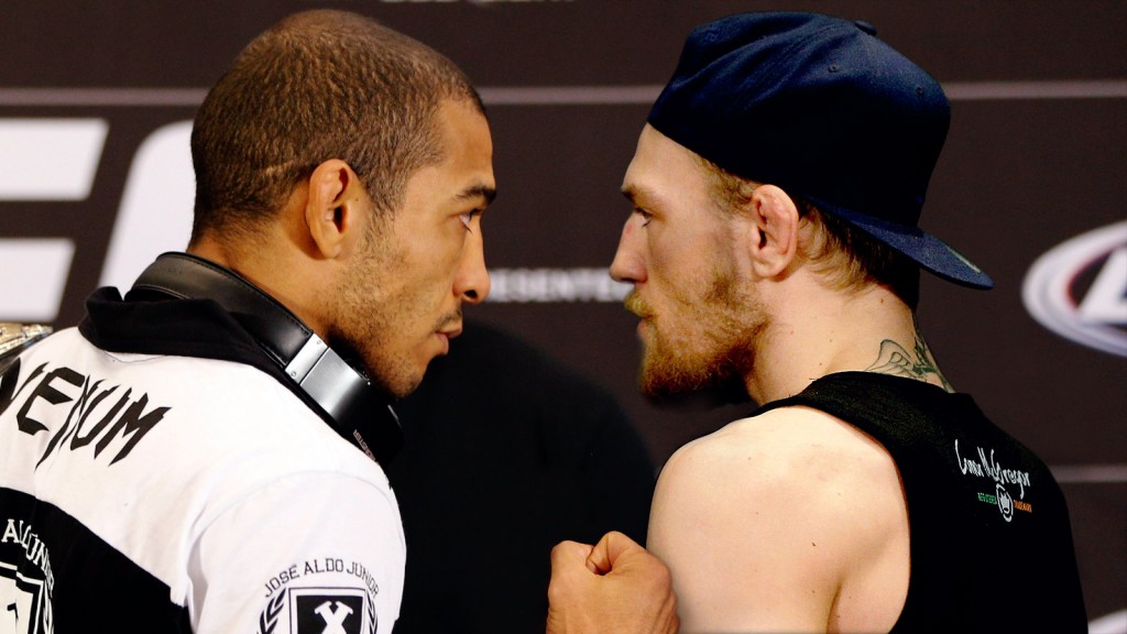 Aldo e Conor em promoção pelo UFC 189. ( Foto: Sportv )